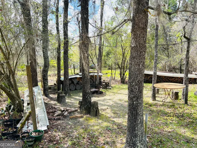 a view of a garden from a balcony
