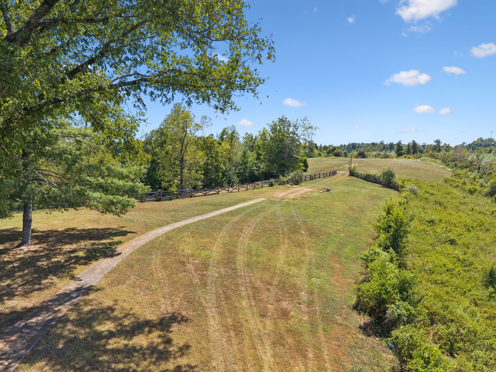 294 Ed Harris Road Ashland City, TN 37015 - Photo 14 of 65 a view of a yard with a tree