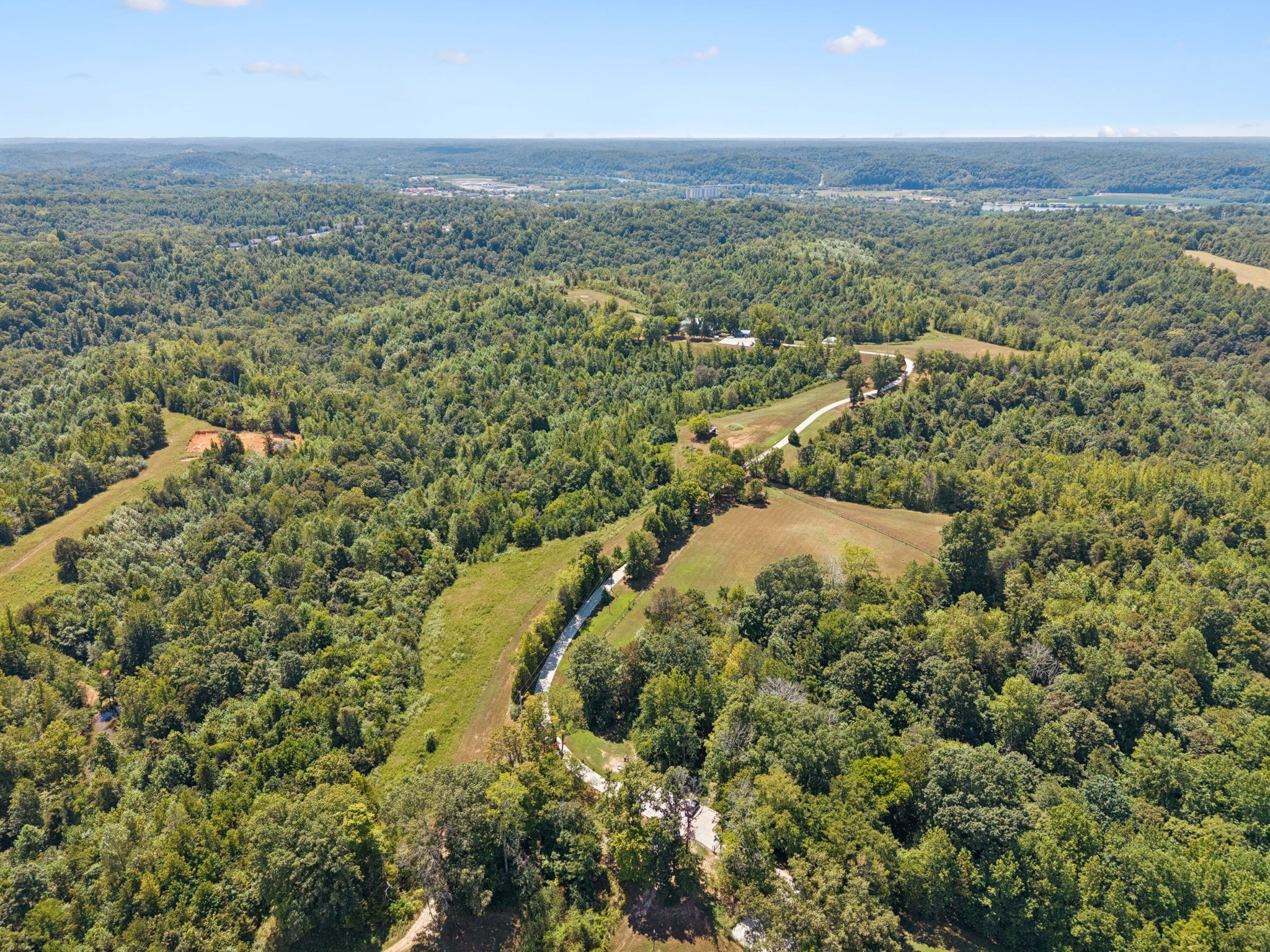 294 Ed Harris Road Ashland City, TN 37015 - Photo 16 of 65 an aerial view of residential houses with outdoor space and trees