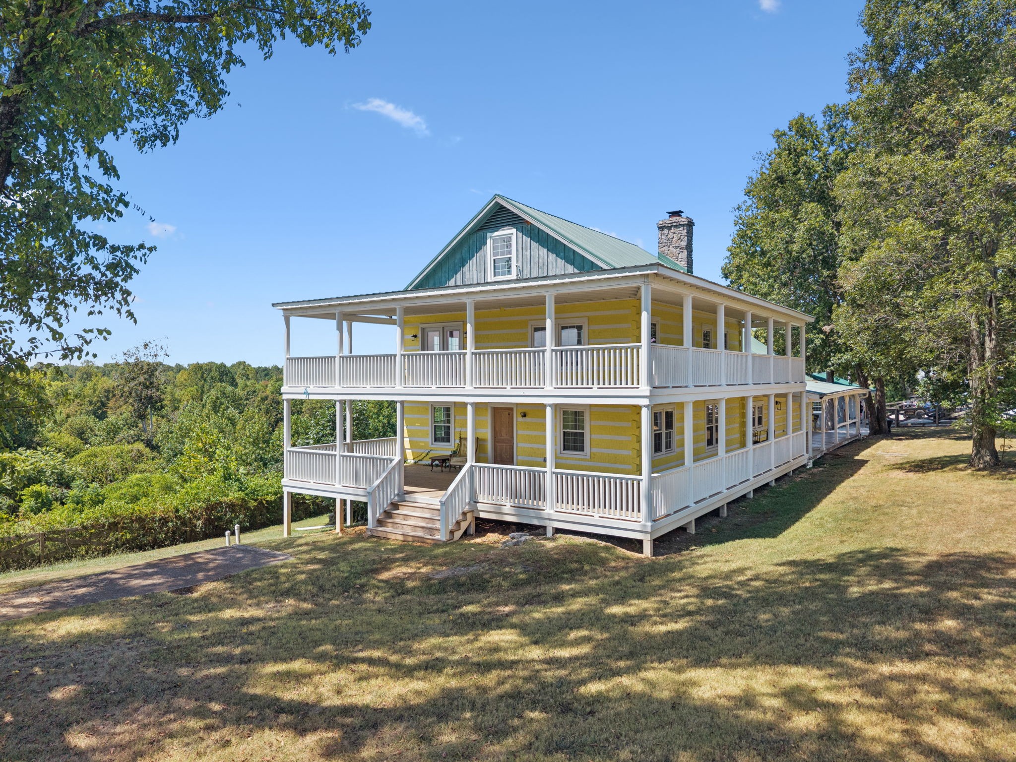 294 Ed Harris Road Ashland City, TN 37015 - Photo 2 of 65 a view of a house with a yard and wooden fence
