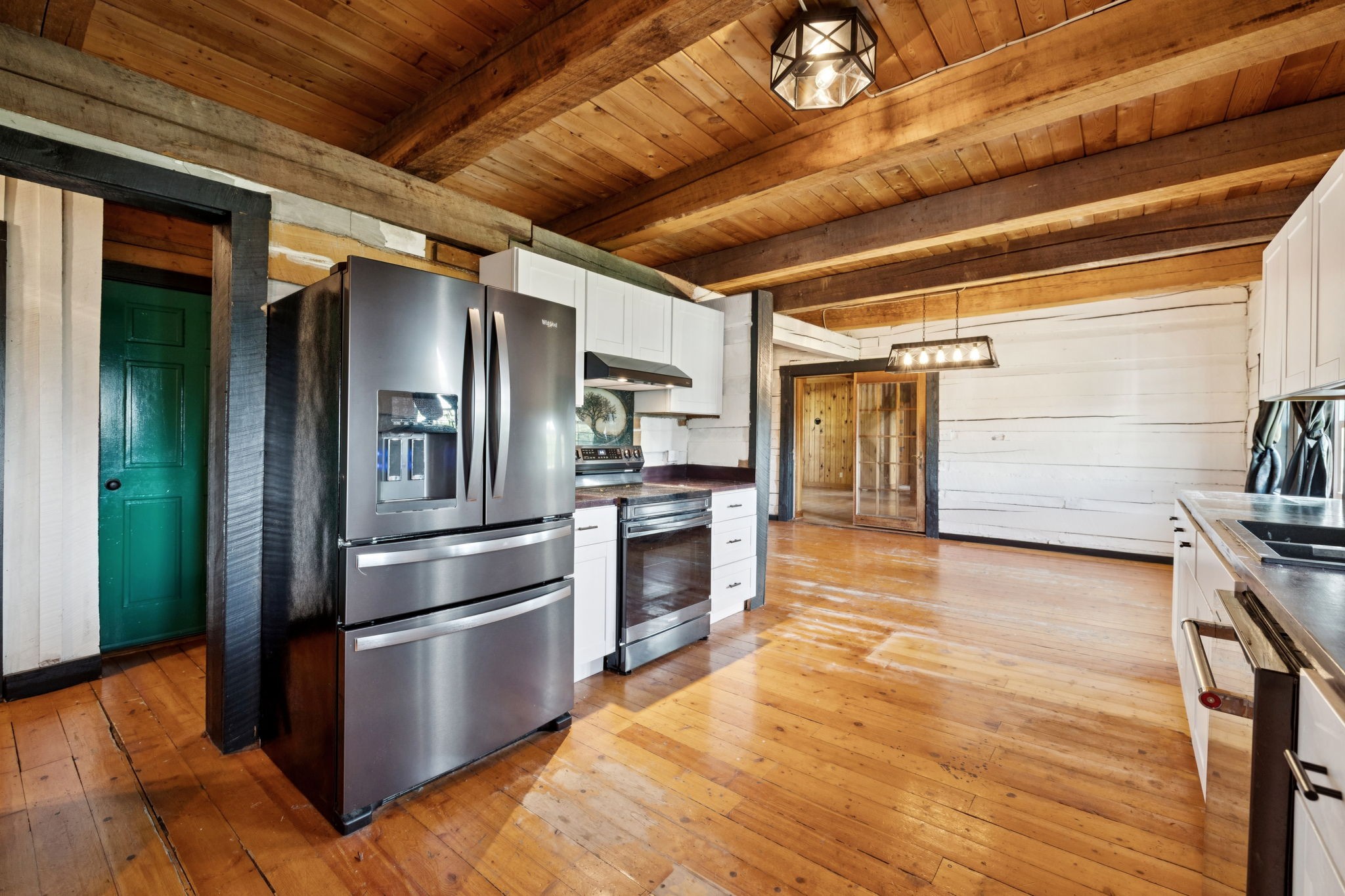 294 Ed Harris Road Ashland City, TN 37015 - Photo 29 of 65 a kitchen with granite countertop stainless steel appliances and wooden floor