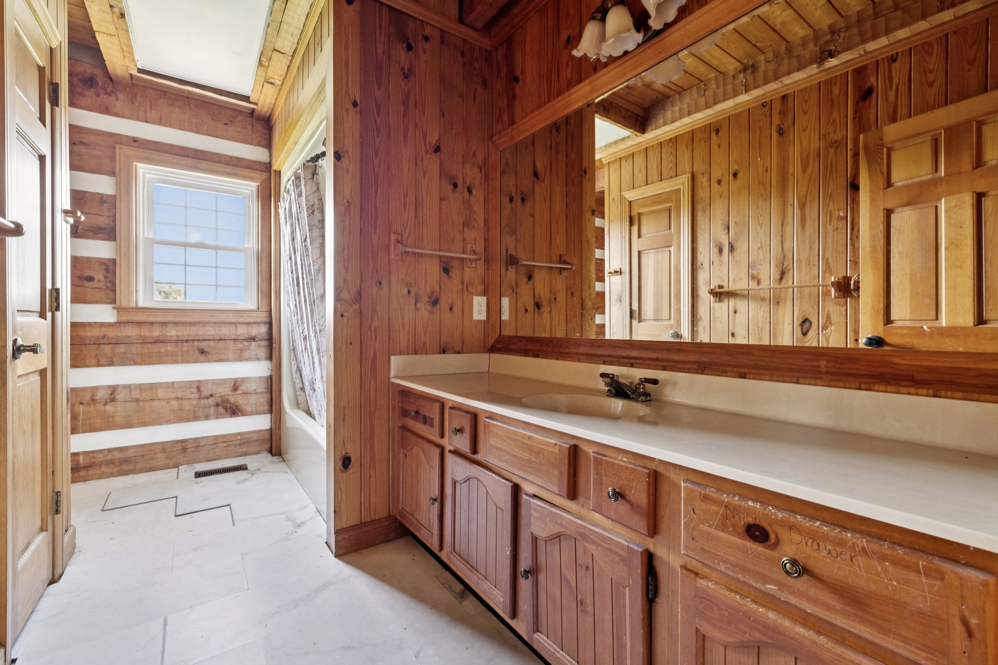 294 Ed Harris Road Ashland City, TN 37015 - Photo 37 of 65 a bathroom with a granite countertop sink and a large mirror