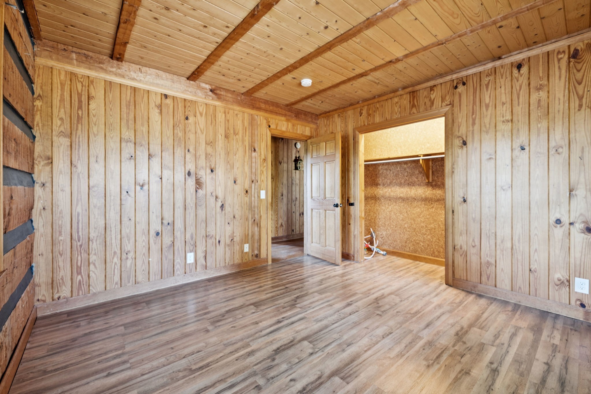 294 Ed Harris Road Ashland City, TN 37015 - Photo 40 of 65 a view of an empty room with wooden floor and a window