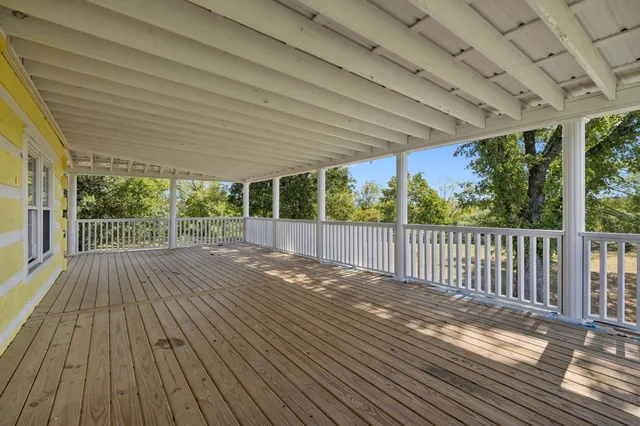 a view of backyard with green space