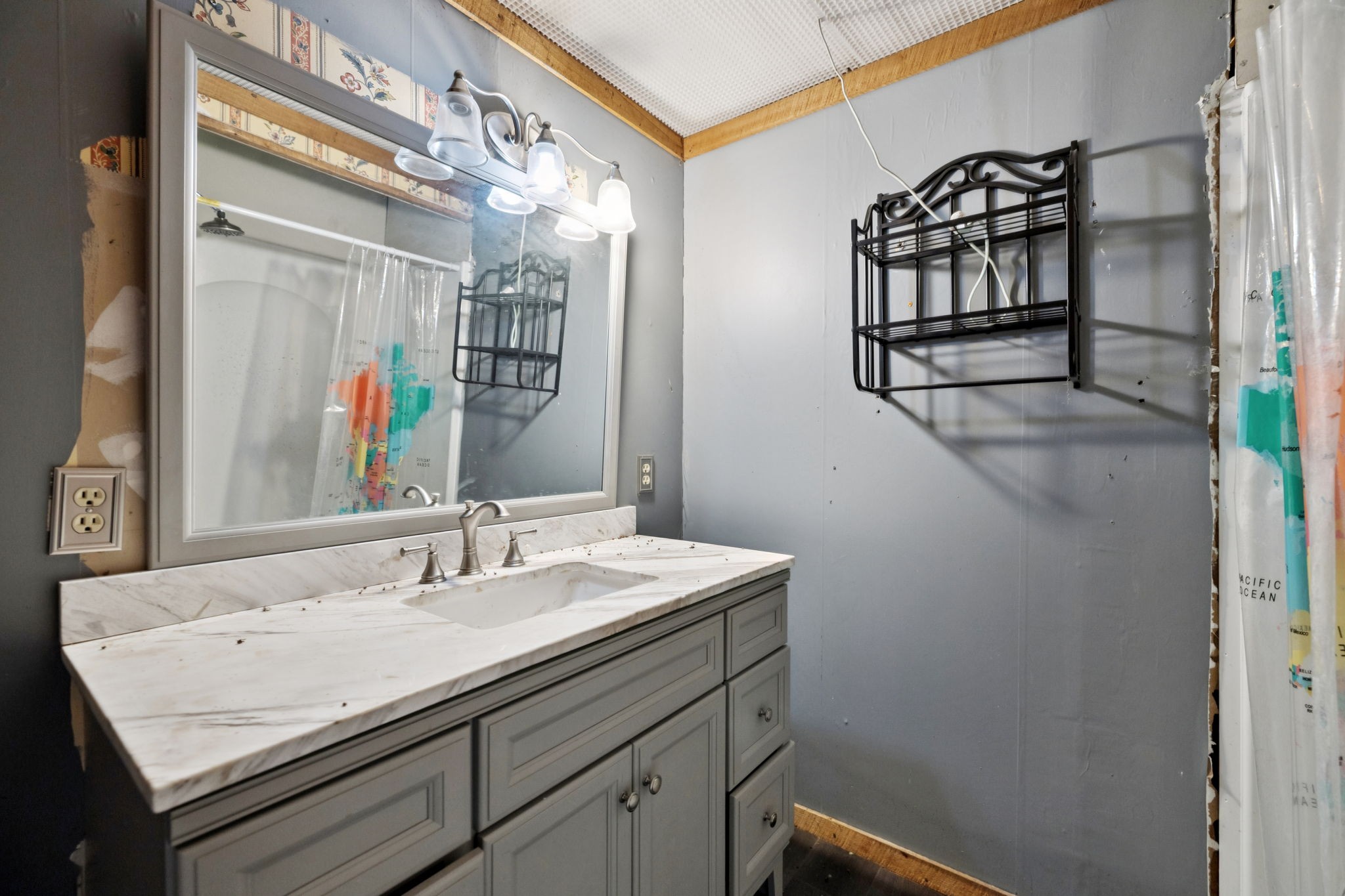 294 Ed Harris Road Ashland City, TN 37015 - Photo 47 of 65 a bathroom with a sink a vanity and a mirror