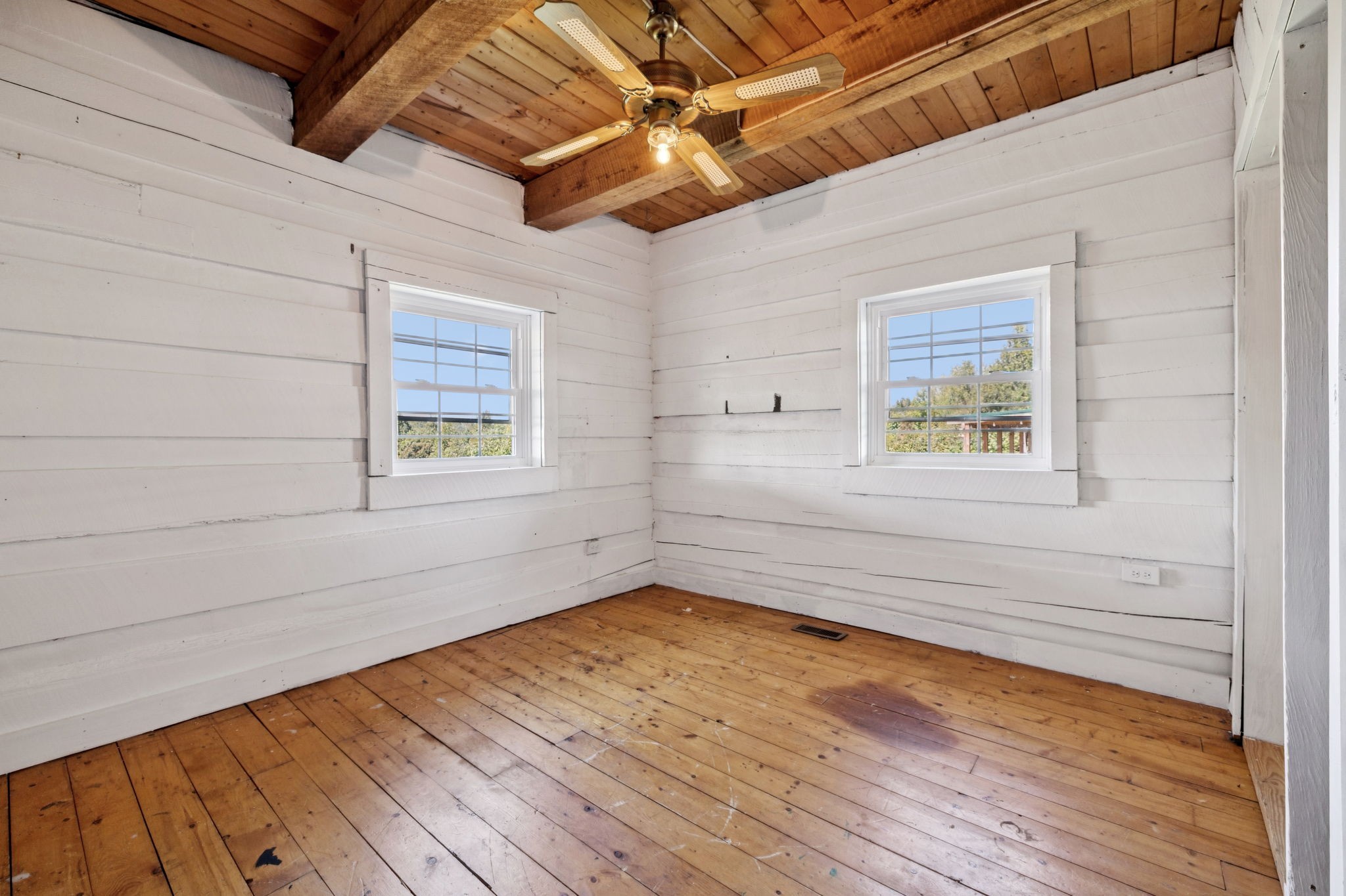 294 Ed Harris Road Ashland City, TN 37015 - Photo 49 of 65 a view of empty room with wooden floor and fan