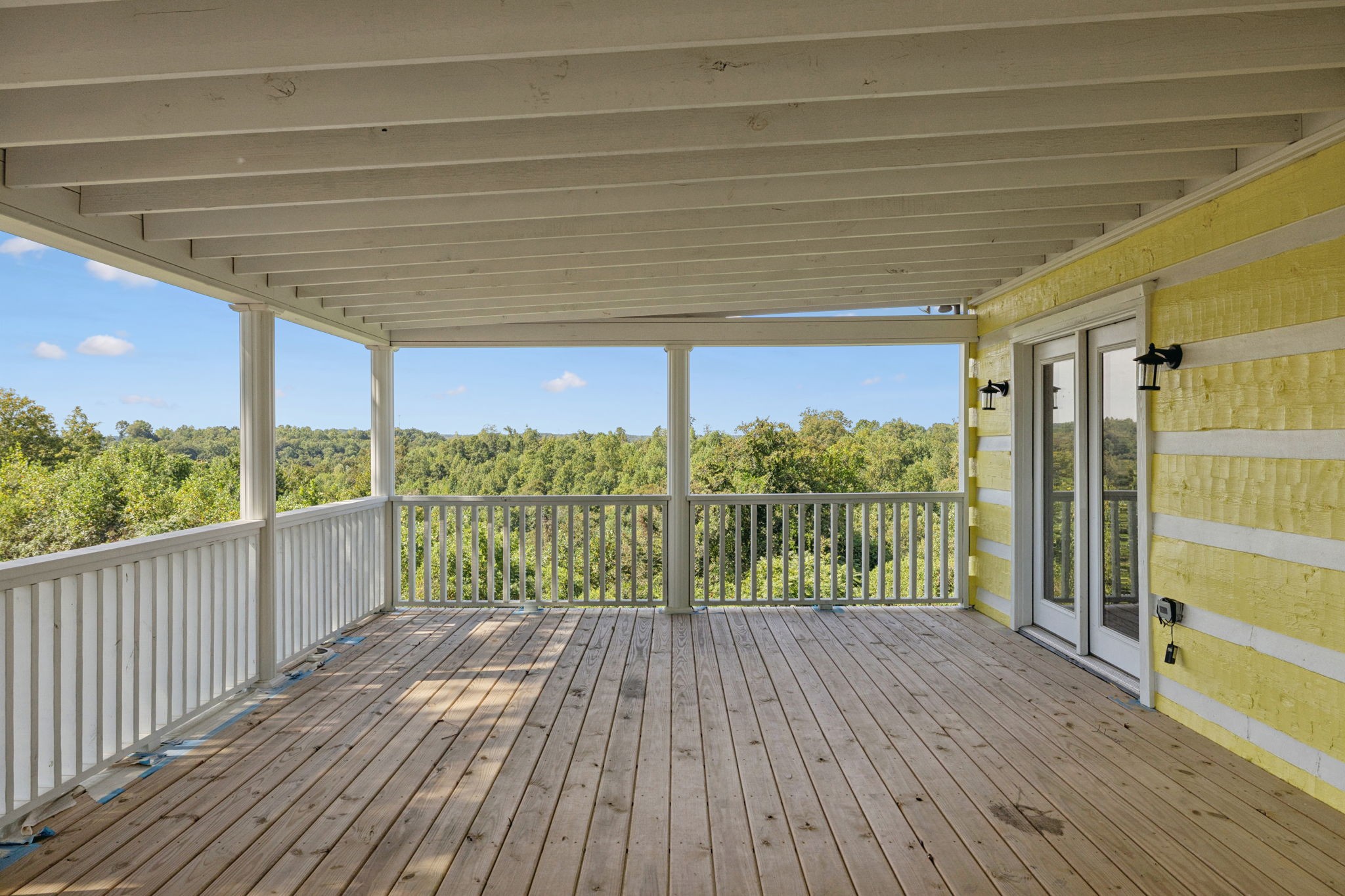 294 Ed Harris Road Ashland City, TN 37015 - Photo 5 of 65 a view of a balcony with wooden floor