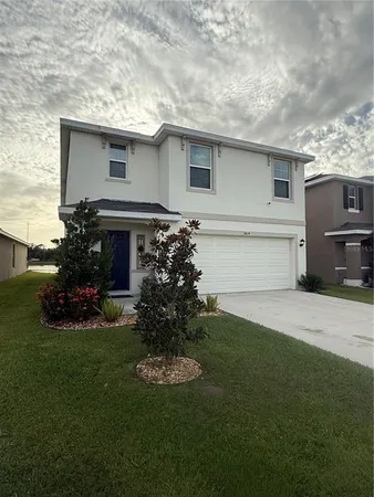 a house view with a garden space