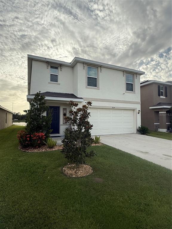2824 Rock Sound Street Bradenton, FL 34208 - Photo 4 of 28 a house view with a garden space
