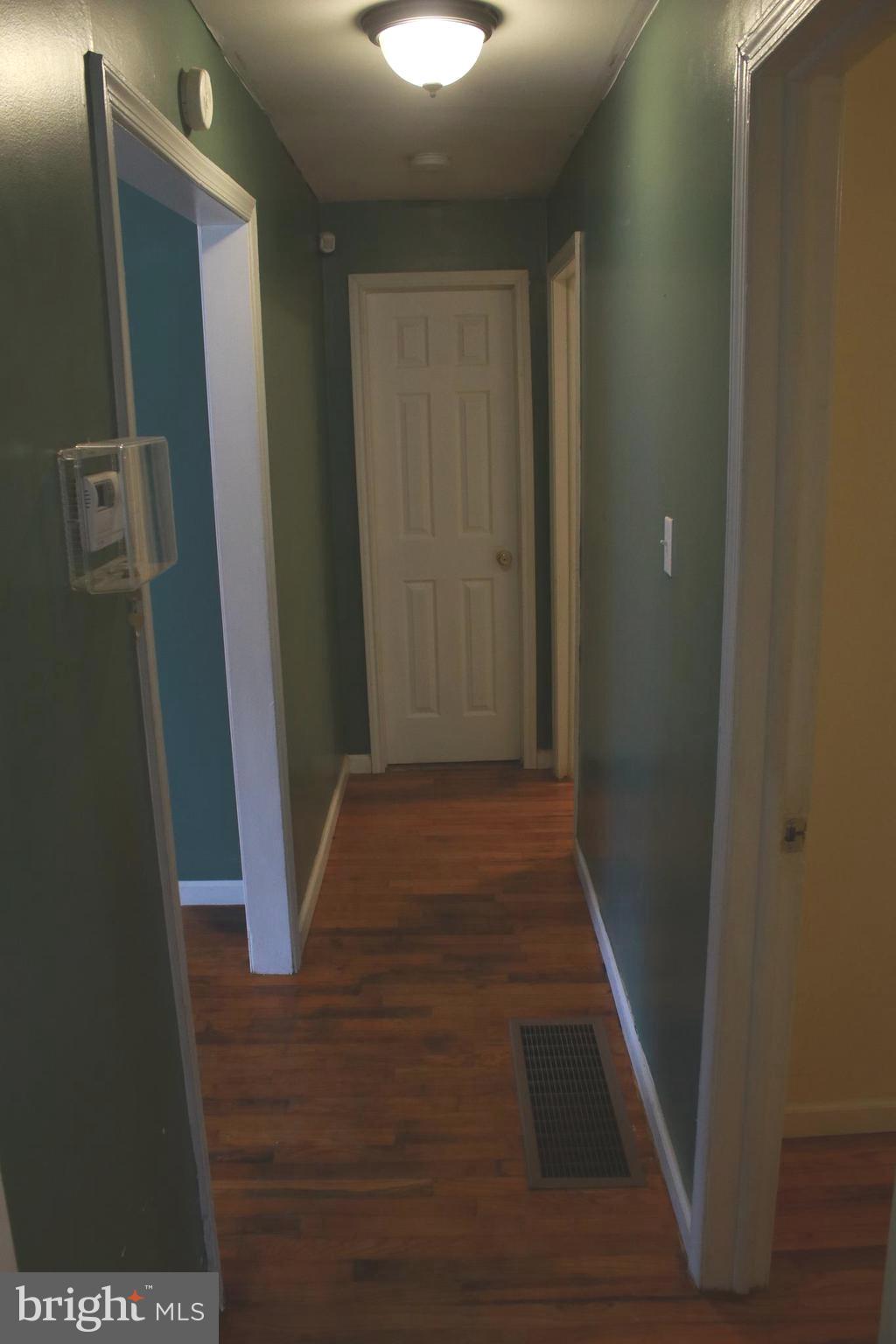 517 Grassdale Street Ranson, WV 25438 - Photo 16 of 26 Hall to additional bedrooms/bathroom/basement