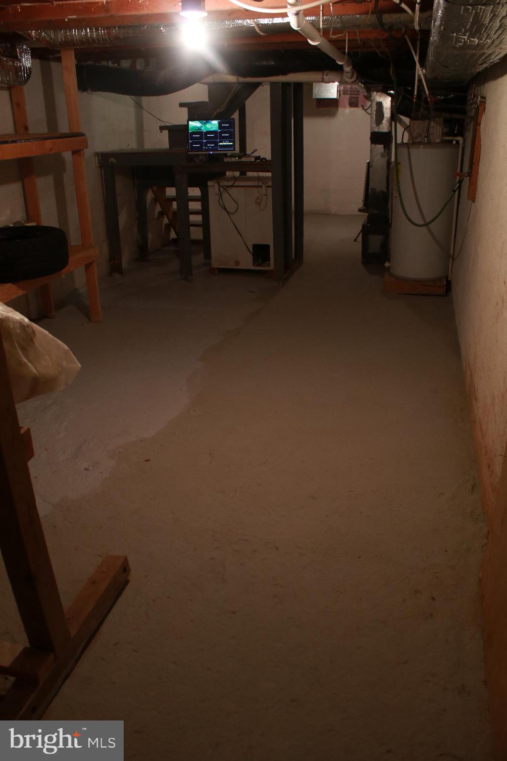 517 Grassdale Street Ranson, WV 25438 - Photo 26 of 26 Basement at far end by crawl space entrance