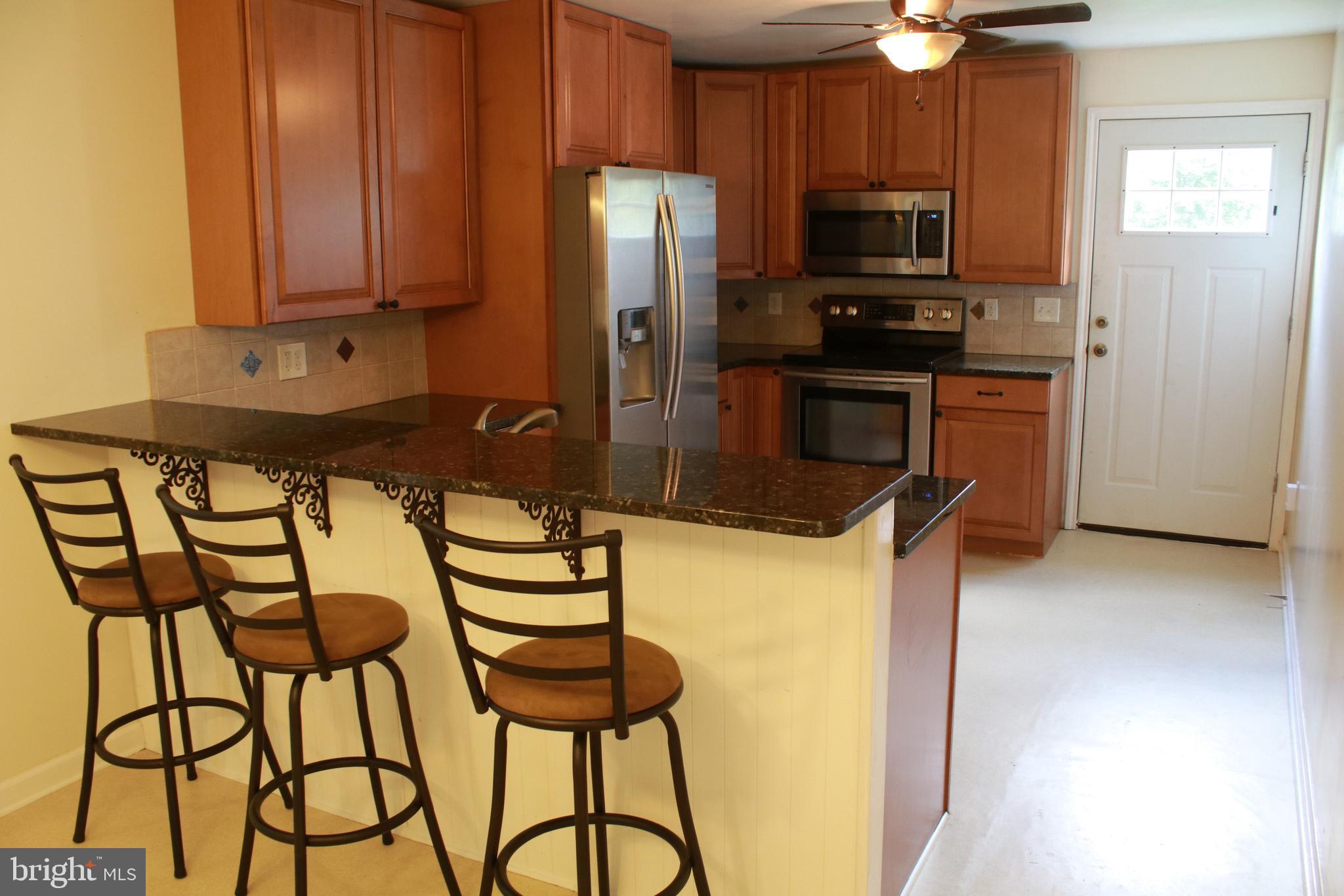 517 Grassdale Street Ranson, WV 25438 - Photo 8 of 26 Breakfast bar and kitchen
