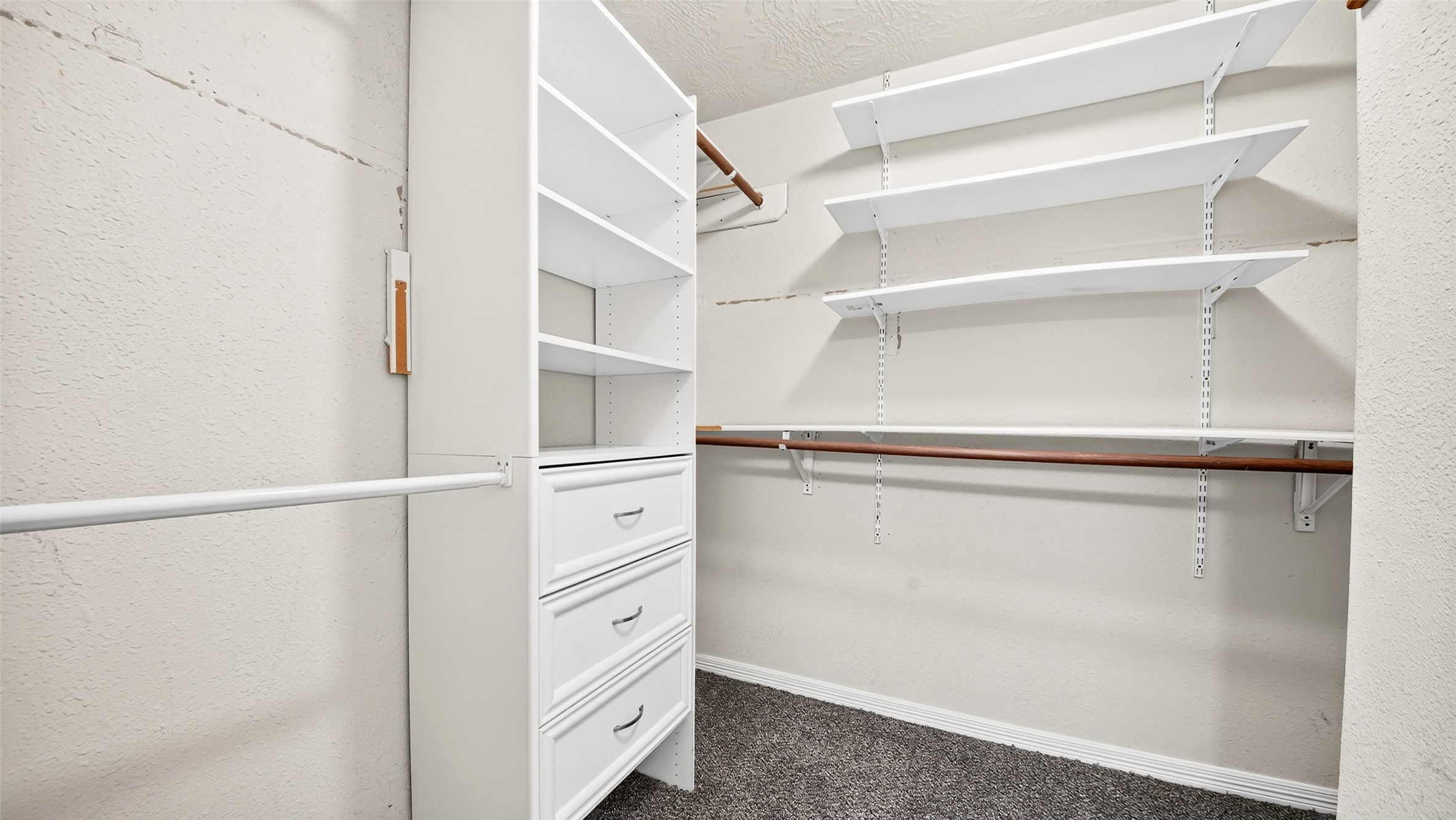 24019 Surreygate Drive Spring, TX 77373 - Photo 19 of 37 Primary Walk-in-Closet