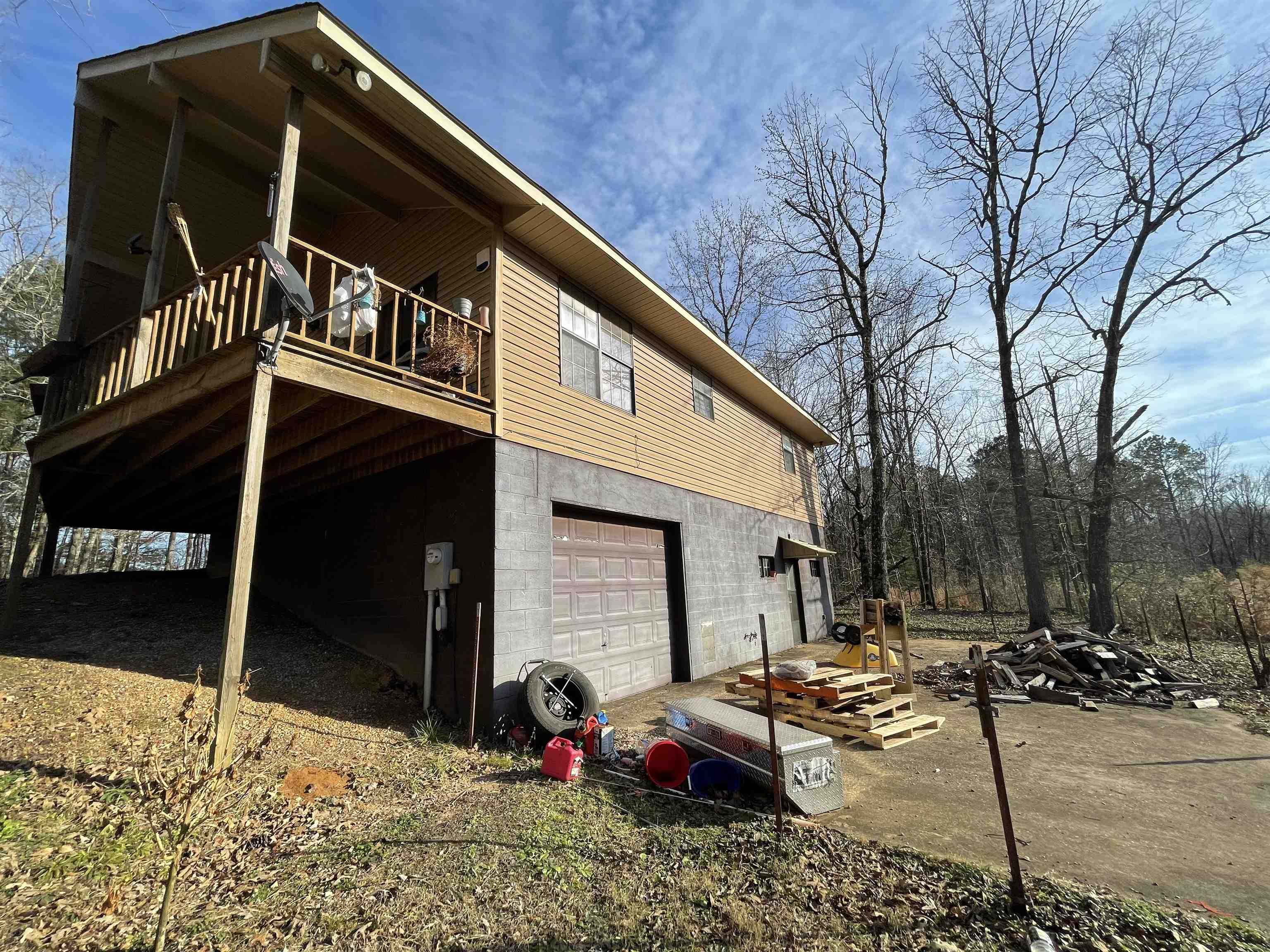 1110 Small Road Morris Chapel, TN 38361 - Photo 2 of 25 a view of a two chair in the patio