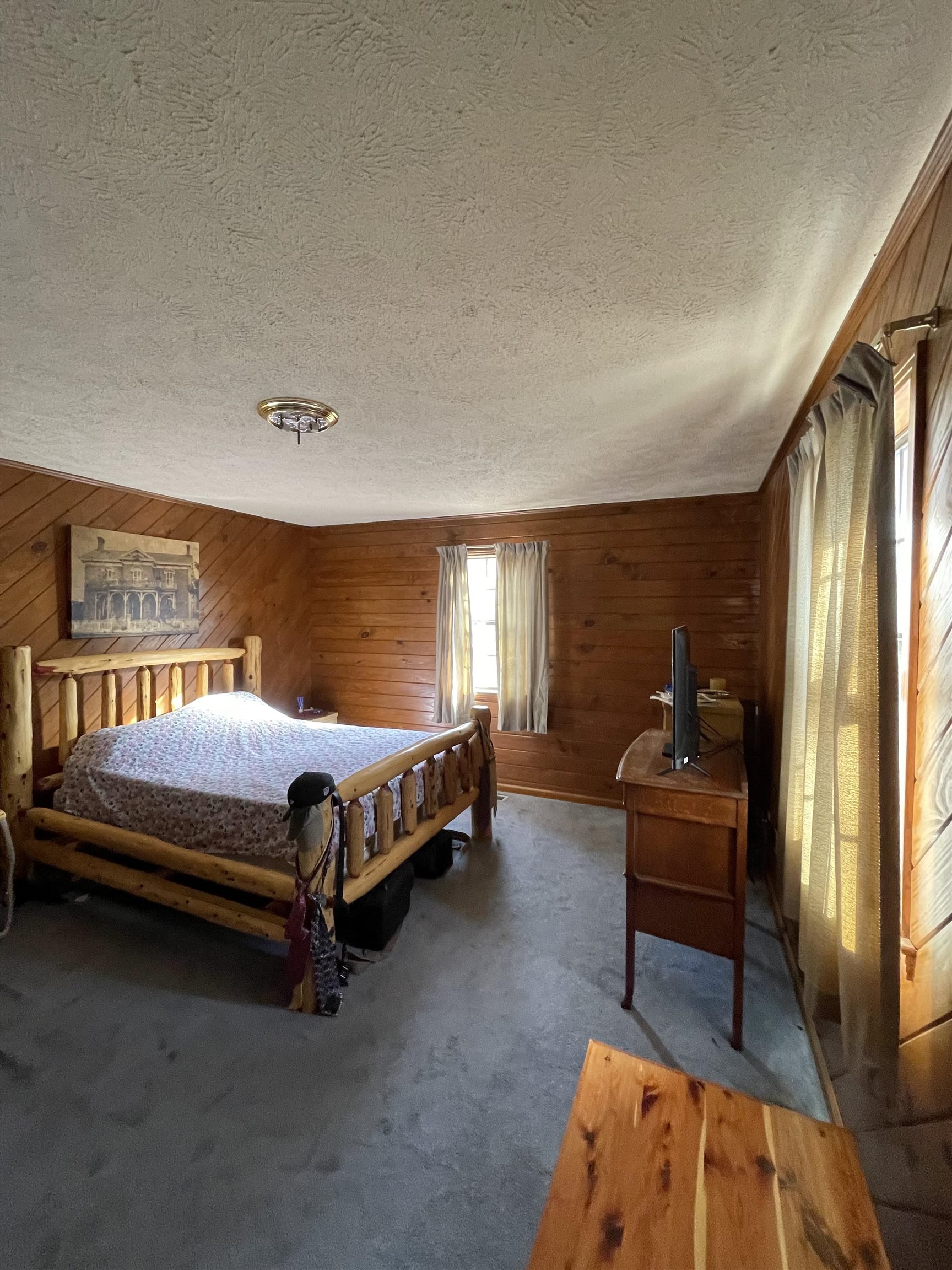 1110 Small Road Morris Chapel, TN 38361 - Photo 9 of 25 a bedroom with a bed and wooden floor