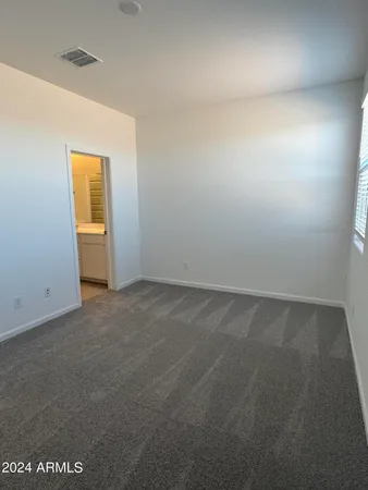 an empty room with a natural light