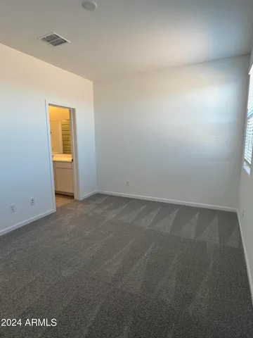 an empty room with a natural light