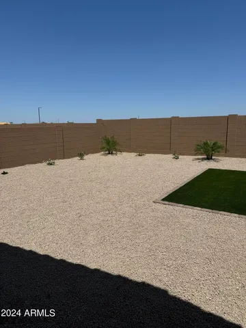 a view of a swimming pool with a bench