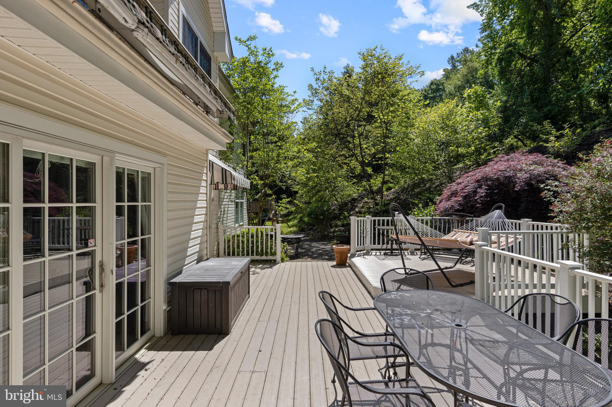 139 Watson Mill Road Landenberg, PA 19350 - Photo 68 of 73 a view of a roof deck with couches chairs and wooden floor