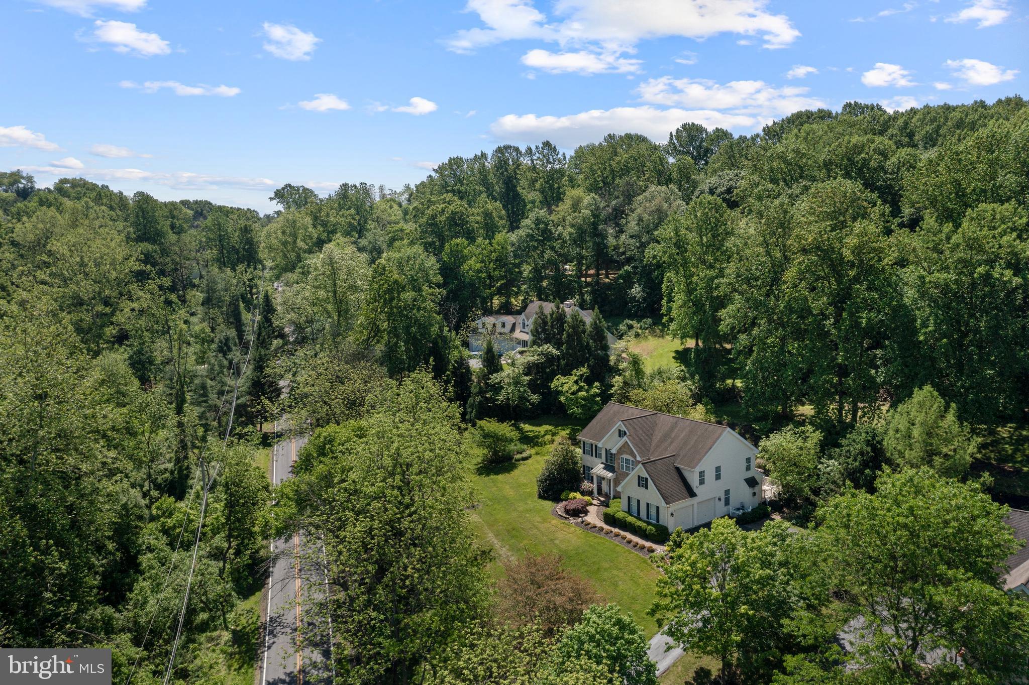 139 Watson Mill Road Landenberg, PA 19350 - Photo 10 of 73 an aerial view of a house with yard and outdoor seating