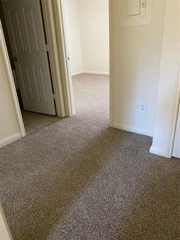 a bathroom with a toilet and a bathtub