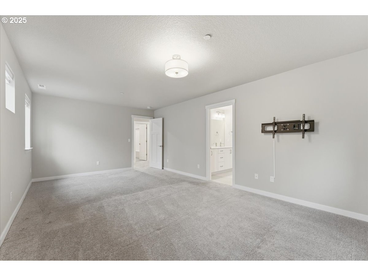 8565 Southwest 176th Avenue Beaverton, OR 97007 - Photo 23 of 39 a view of empty room