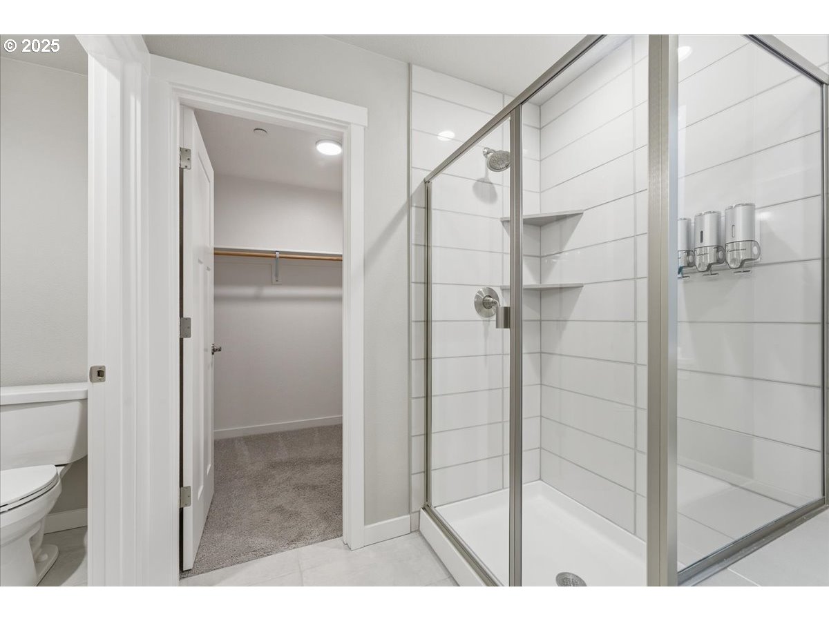8565 Southwest 176th Avenue Beaverton, OR 97007 - Photo 27 of 39 a bathroom with a shower and toilet
