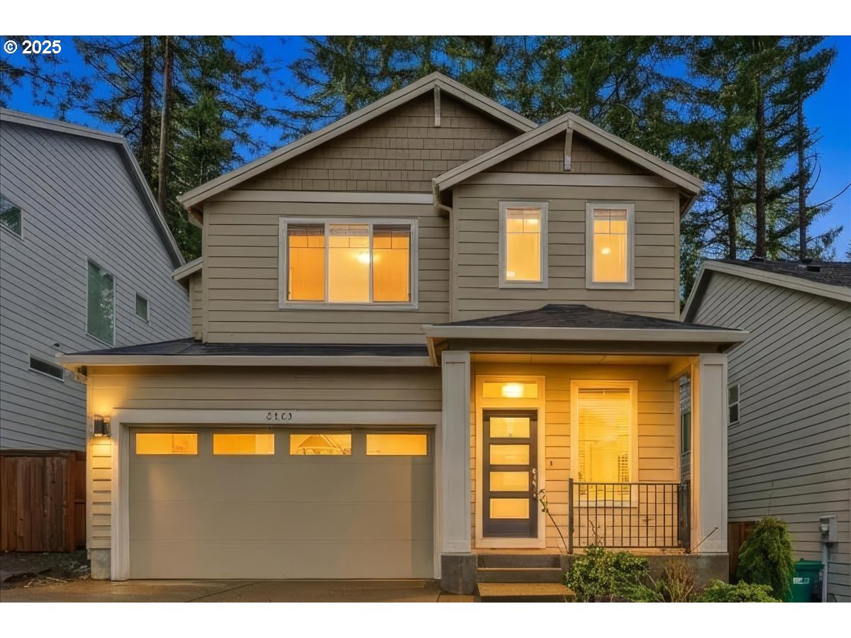 8565 Southwest 176th Avenue Beaverton, OR 97007 - Photo 39 of 39 a view of a house with a large window and wooden fence