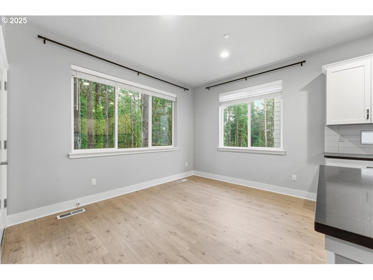 8565 Southwest 176th Avenue Beaverton, OR 97007 - Photo 9 of 39 a view of an empty room with a window
