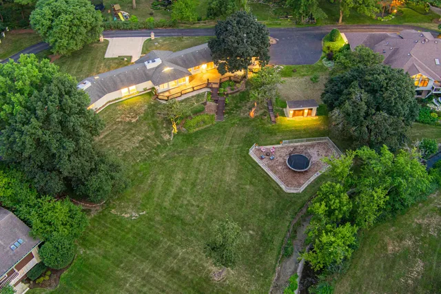 an aerial view of a house with a garden