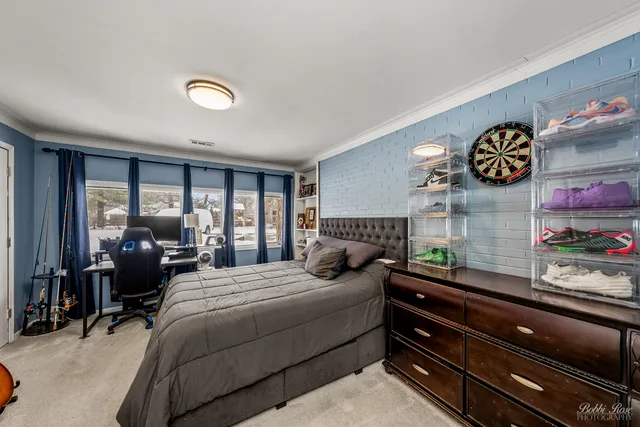 an aerial view of residential house with outdoor space and street view