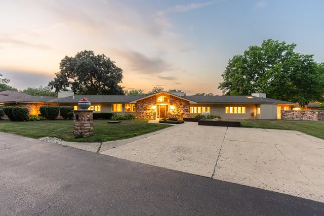 a view of an outdoor space with garden and deck