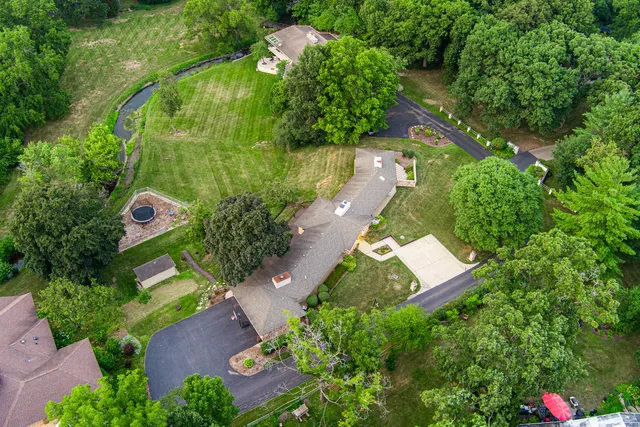 a view of a backyard with a small cabin