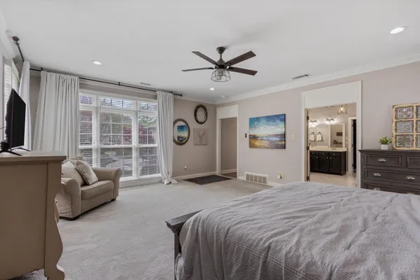 a bed room with a bed and furniture