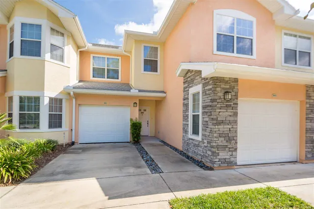 a front view of a house having yard