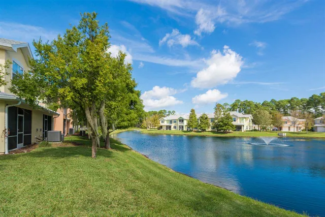 a view of a two chairs on the roof deck