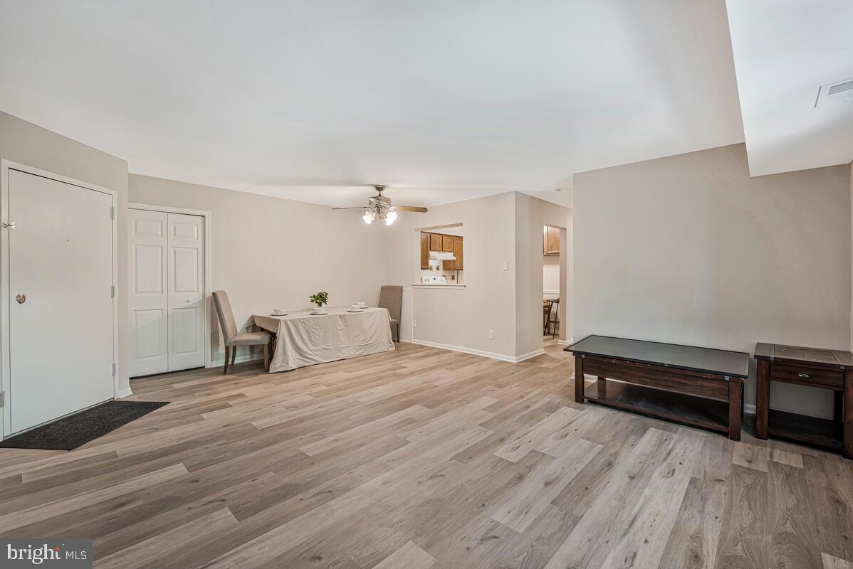 20334 Beaconfield Terrace, Unit 2 Germantown, MD 20874 - Photo 8 of 24 a view of a livingroom with furniture