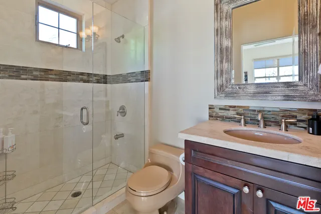 a view of a room with furniture and a potted plant