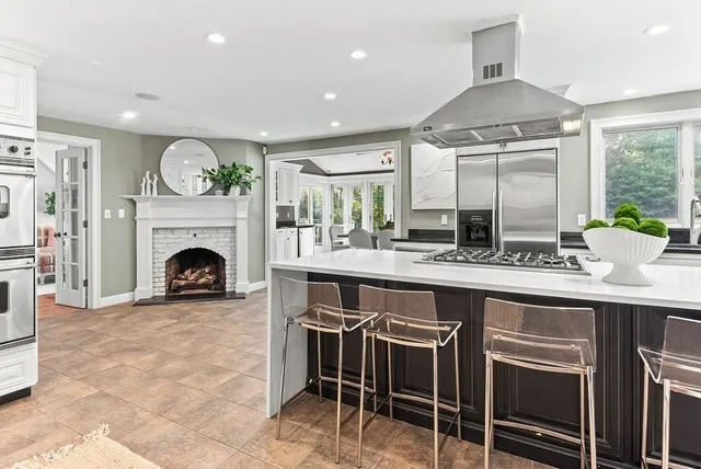 a kitchen with a sink and a stove