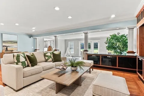 a living room with furniture and window