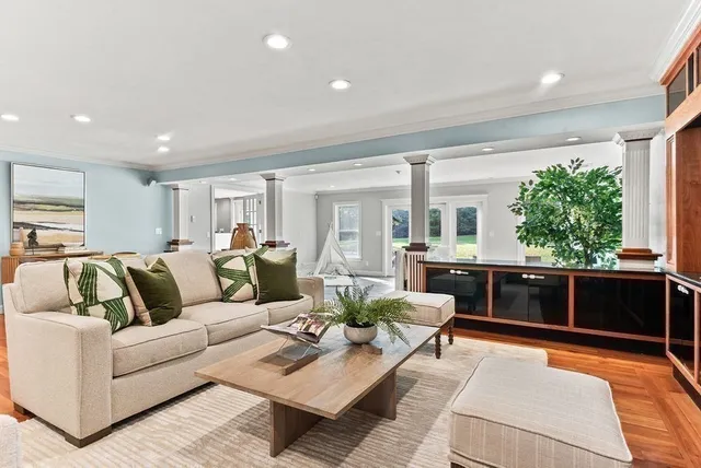 a living room with furniture and window