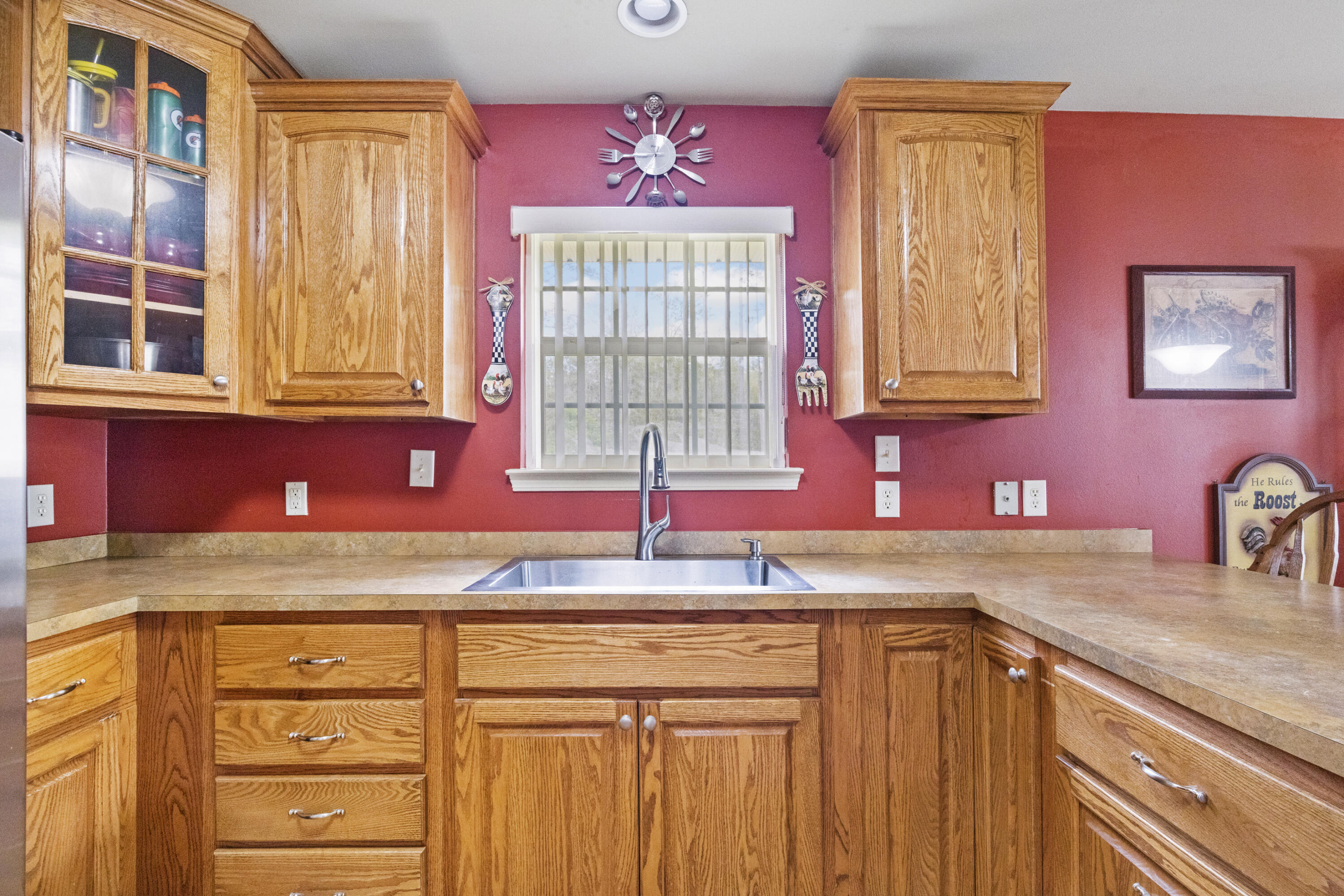 1582 Greenwood Road Baker, FL 32531 - Photo 13 of 52 a kitchen with granite countertop cabinets and window