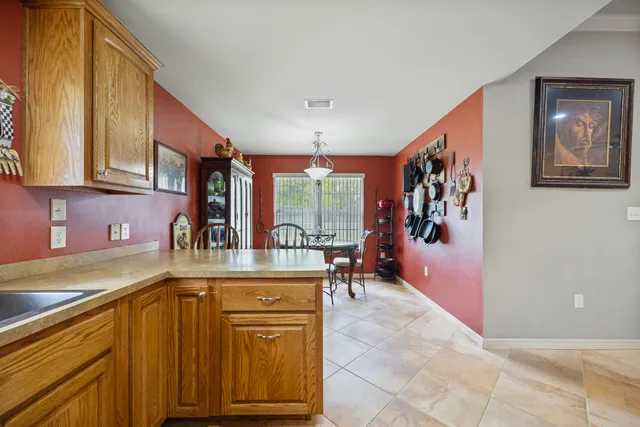 a bedroom with a bed and a ceiling fan
