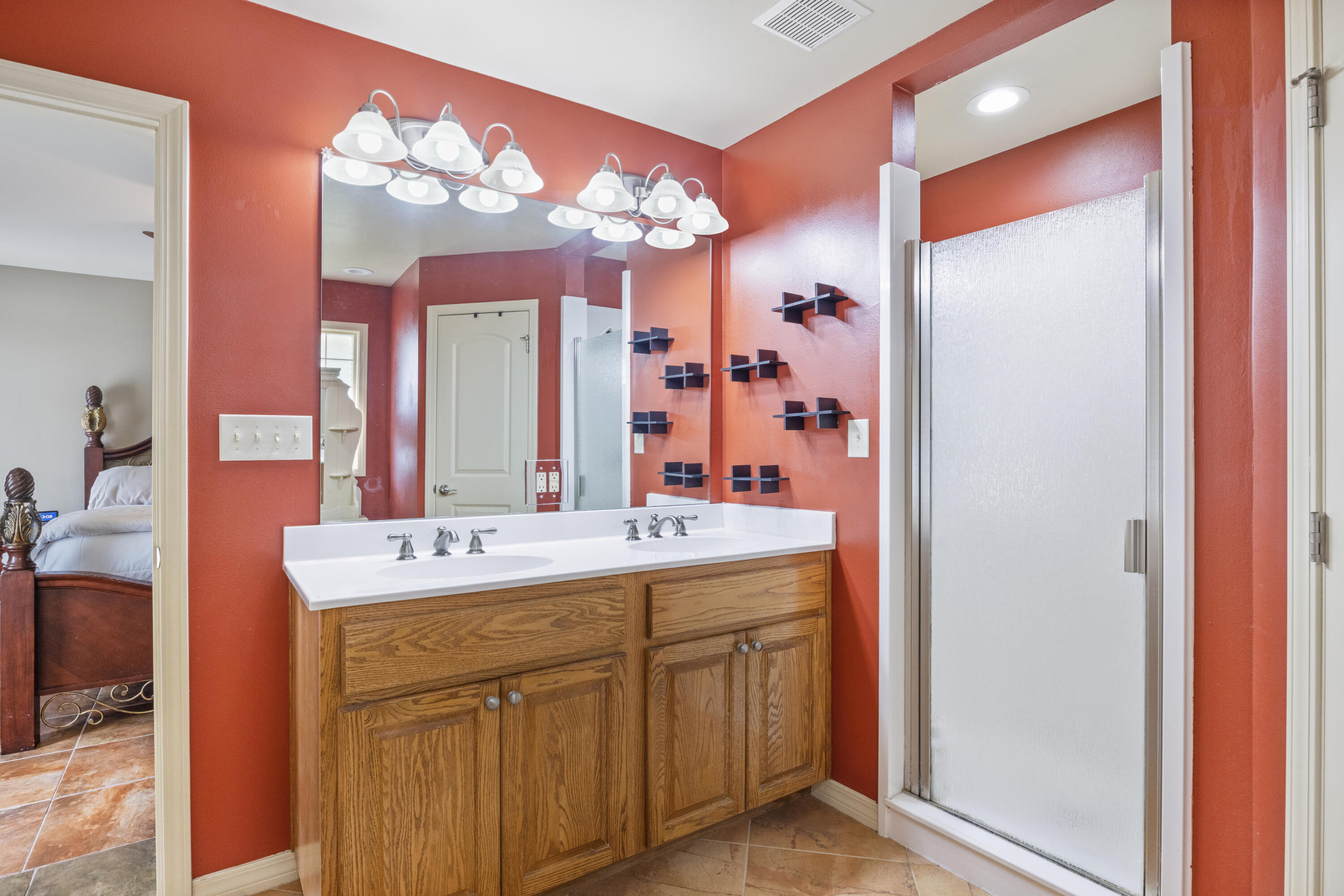 1582 Greenwood Road Baker, FL 32531 - Photo 20 of 52 a bathroom with a double vanity sink mirror and double