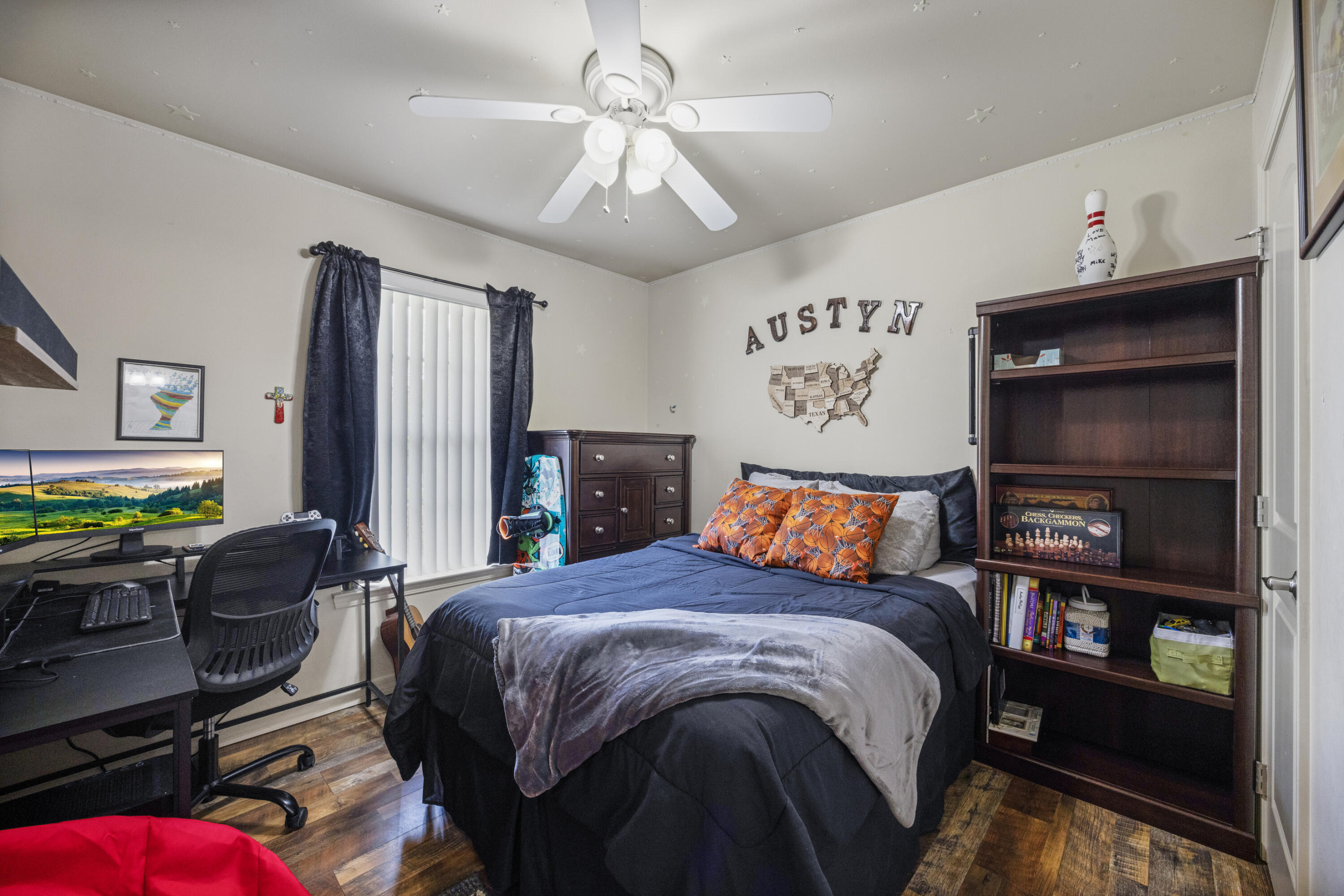 1582 Greenwood Road Baker, FL 32531 - Photo 23 of 52 a bedroom with a bed dresser and a large window