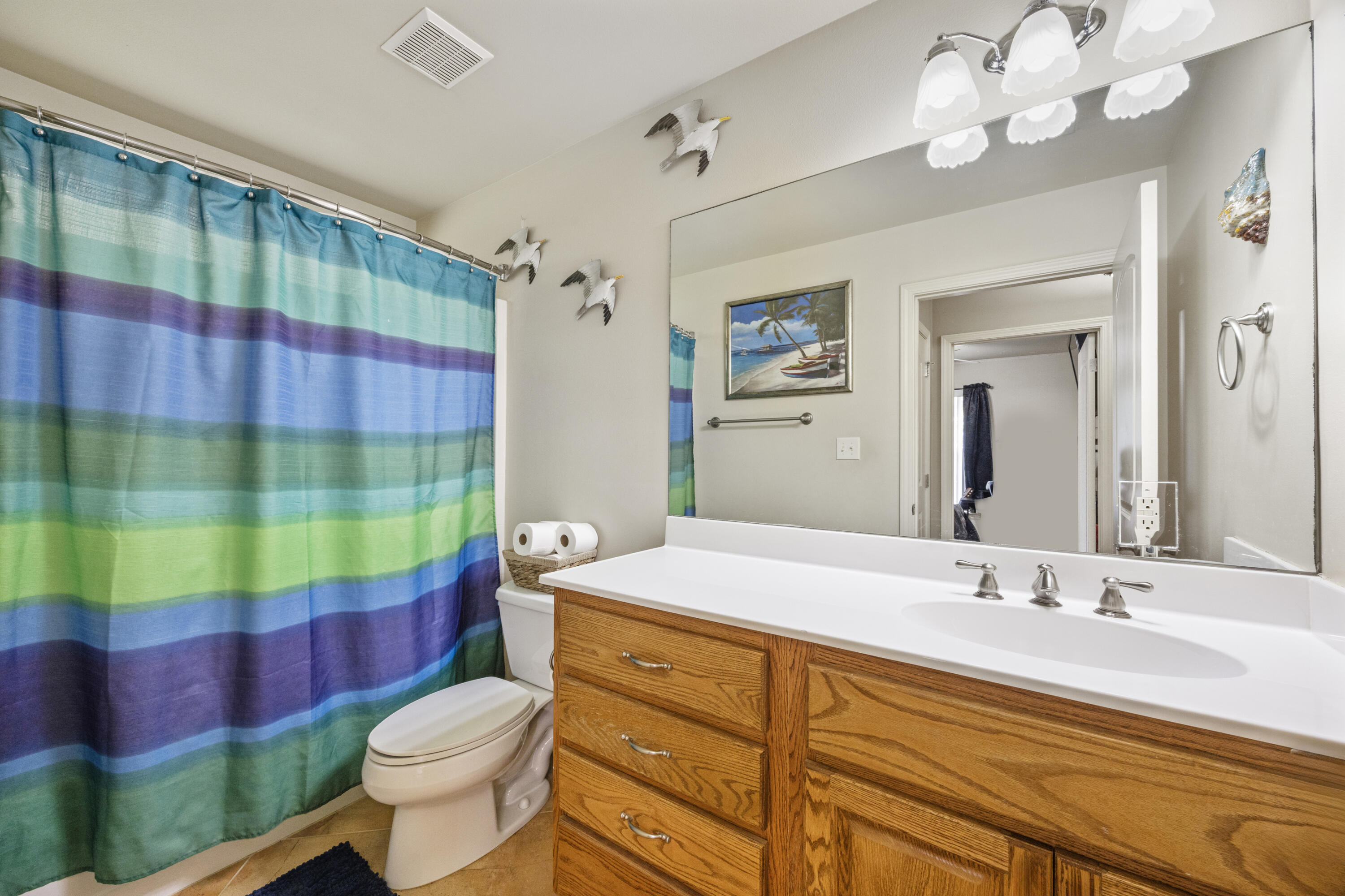 1582 Greenwood Road Baker, FL 32531 - Photo 24 of 52 a bathroom with a sink a toilet and shower