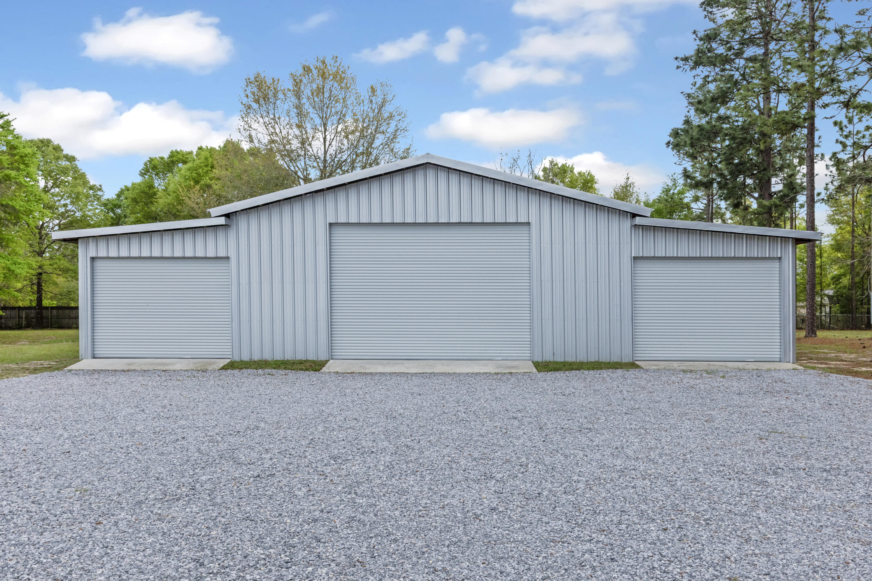 1582 Greenwood Road Baker, FL 32531 - Photo 34 of 52 a backyard of a house