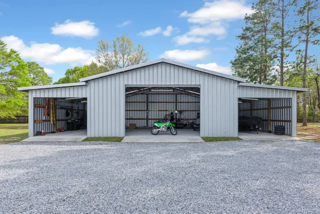 a view of a garage with a table and chairs