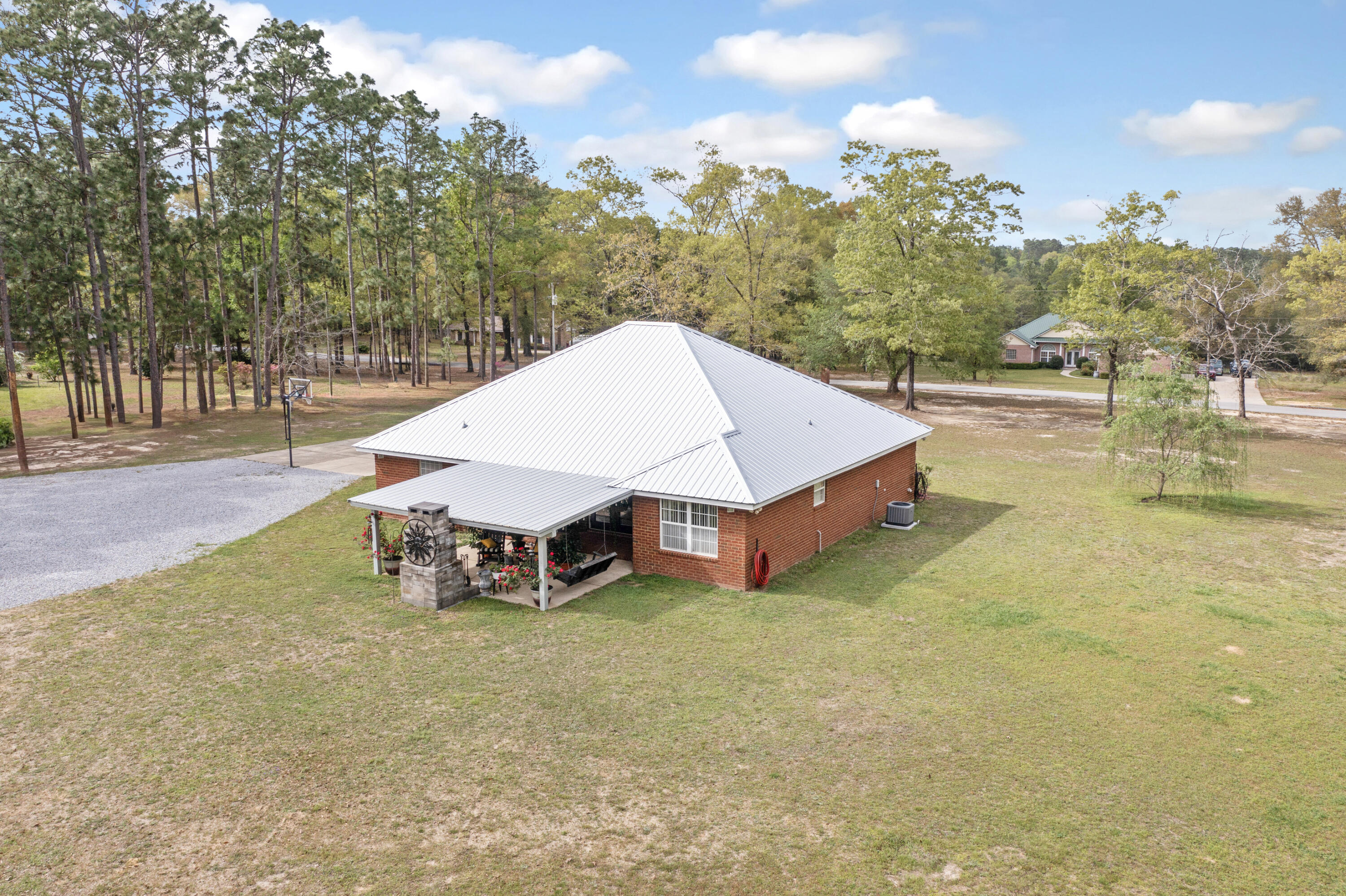 1582 Greenwood Road Baker, FL 32531 - Photo 49 of 52 a view of a backyard with swimming pool