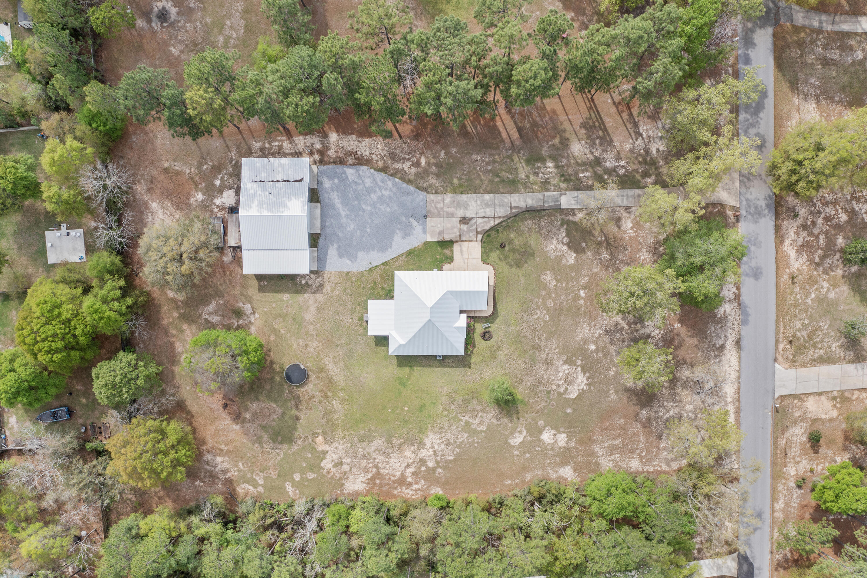 1582 Greenwood Road Baker, FL 32531 - Photo 51 of 52 an aerial view of a house with a yard
